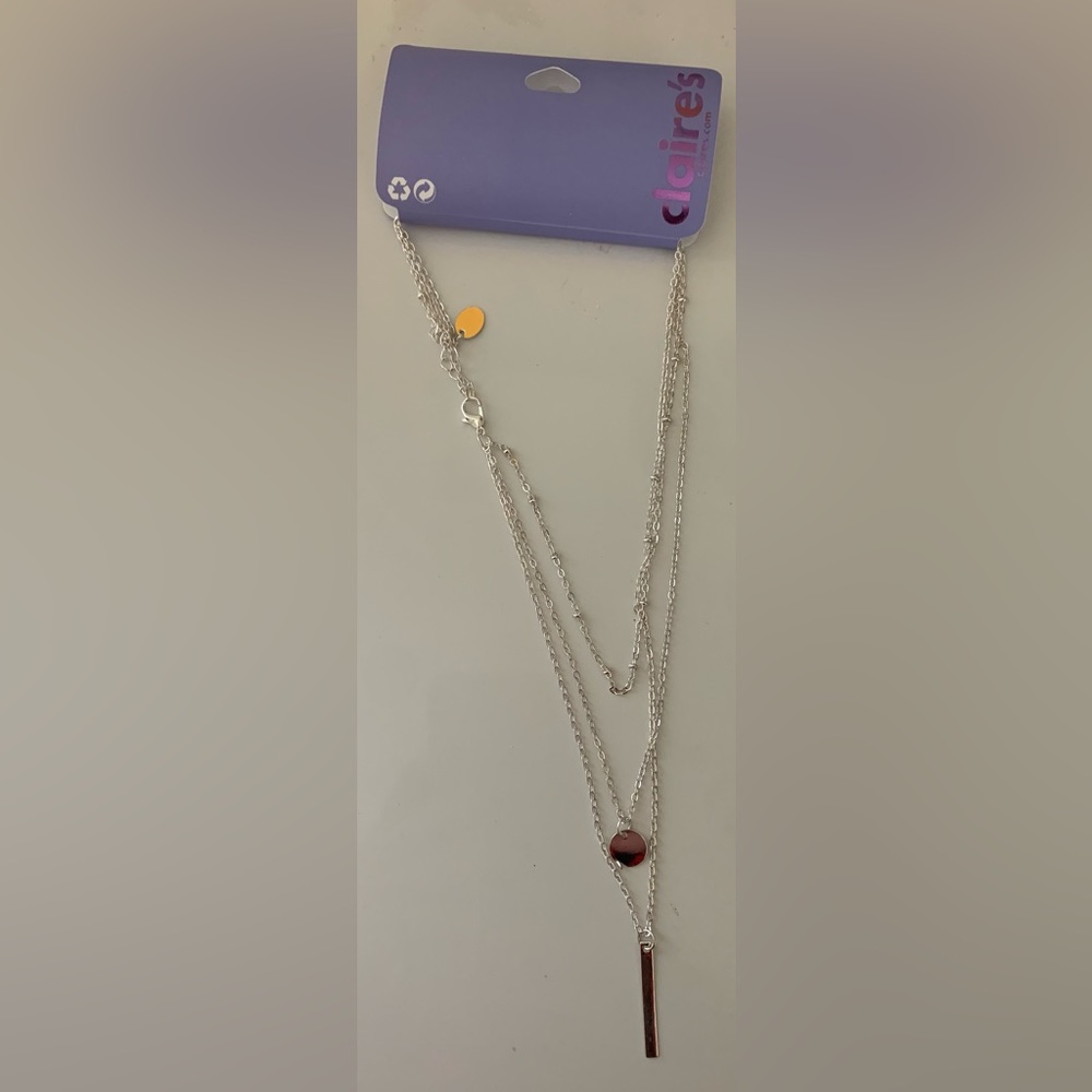 Claire’s silver 3 layered necklace.